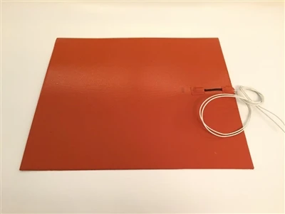 How do silicone rubber heaters distribute heat evenly in freeze dryers?